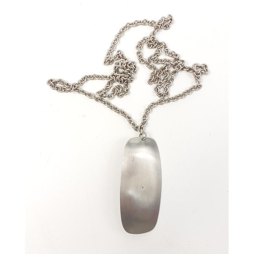 67 - A STYLISH RETRO stainless steel pendant on a white metal chain with a lilac style stone inset - dime... 