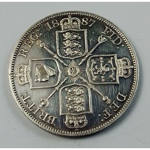 82B - An 1887 Victorian Crown coin. Bright with good detail but appears to have been cleaned with surface ... 