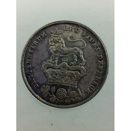 82K - An 1825 George IV Shilling in superior grade.  Lovely detail with crisp clean fields. Definitely a g... 