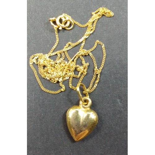 9 - A small 40cm 9K marked chain with a gilt coloured unmarked heart.  A very pretty little comb.  Total... 