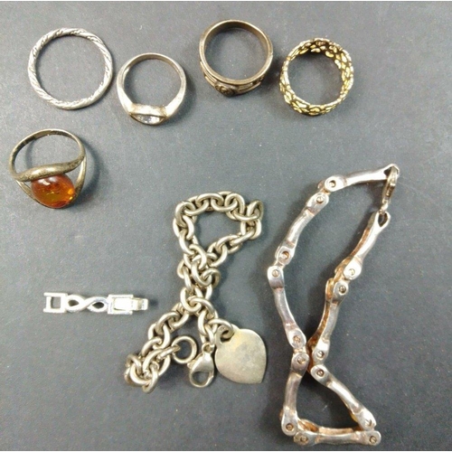 95 - A silver collection to include an articulated bracelet stamped 925, 20cm approx, a chain bracelet wi... 