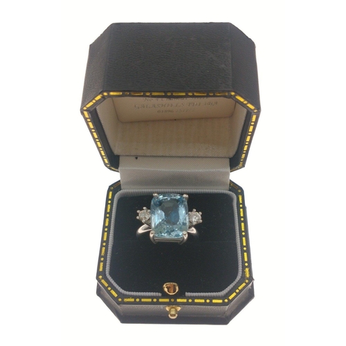 1A - A stunning 18ct white gold fully hallmarked ladies dress ring with a large cushion Aquamarine centre... 