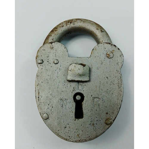 114E - RAILWAY MEMORABILIA.  A wonderful old heavily used NBR stamped padlock that has seen much service an... 