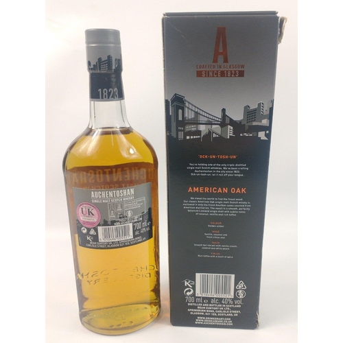 144 - A bottle of AUCHENTOSHAN single malt Scotch whisky triple, 700ml, distilled in first and second fill... 