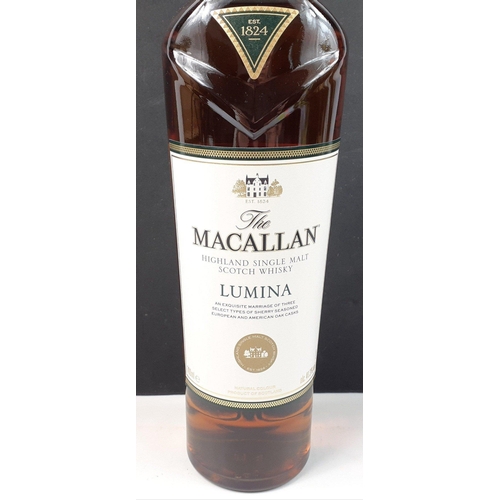 158 - Four bottles of MACALLAN Highland single malt whisky exclusive to travellers, each 700ml in presenta... 