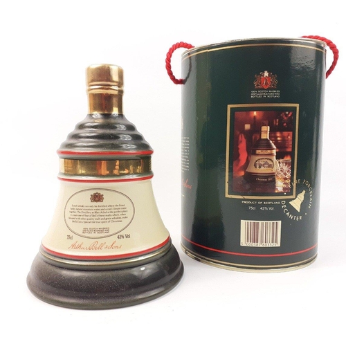 225 - Let the bells ring out for Christmas - a Bell's decanter, 70cl  in 1990 tin#50