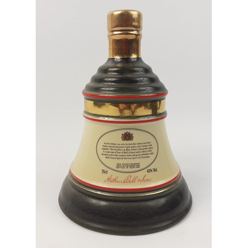 225 - Let the bells ring out for Christmas - a Bell's decanter, 70cl  in 1990 tin#50