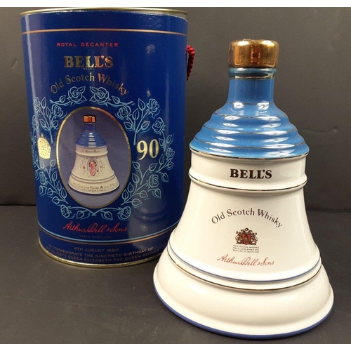 246 - BELL's Two Royal commemorative decanters with contents in presentation boxes. 1990 Queen Mother 90th... 