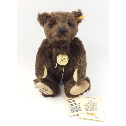 295 - A STEIFF 1920 Classic teddy bear with mohair fur, reference 000829, stands 25cm tall, with all label... 