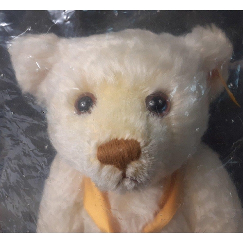 299 - A STEIFF white MILLENNIUM bear by Danbury Mint, reference 654701 standing 27cm high with mohair fur,... 