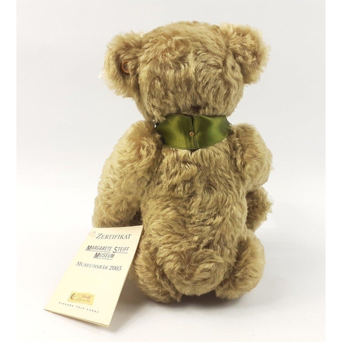 312 - A STEIFF museum mohair bear with Margarete Steiff porcelain medallion on olive green ribbon, referen... 