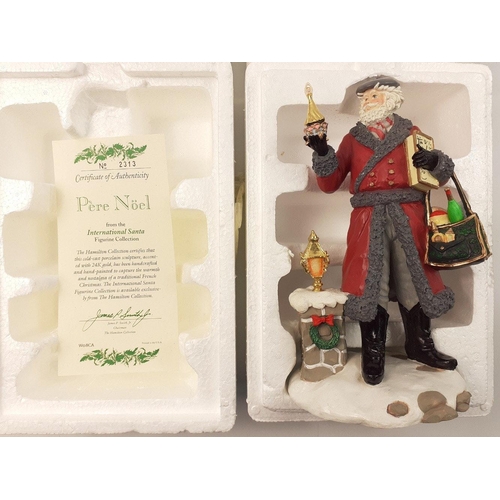 329 - A boxed PERE NOEL and a BELSNICKEL figurine from the Hamilton Collection#79