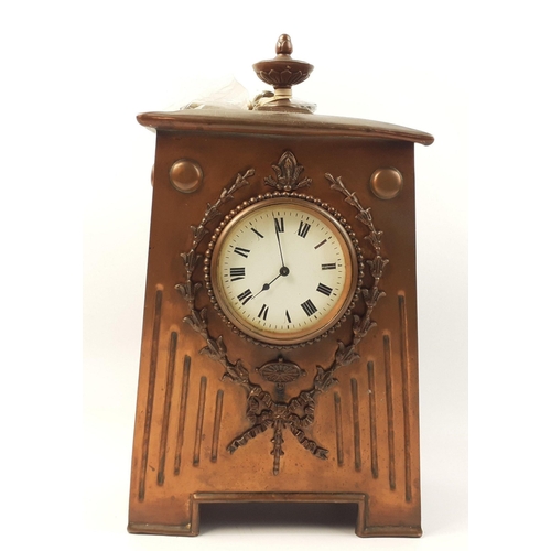 123 - A copper cased antique mantel clock stamped EP to rear standing 35cm to finial, supplied with key, u... 