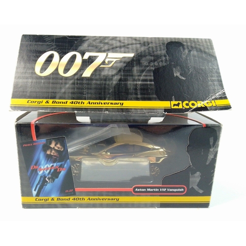 130 - A CORGI CC0 7505 Aston Martin V12 Vanquish with gold finish in box with rockets#130