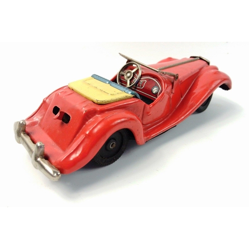 132 - A super antique foreign racing car made by BANDAI toys, unusually complete with bumpers, wheels and ... 