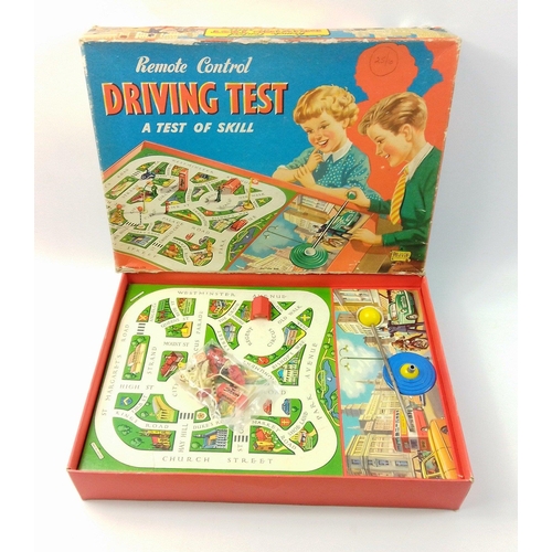 151 - A vintage Merit Toy remote control driving test game in lovely condition complete with control stick... 