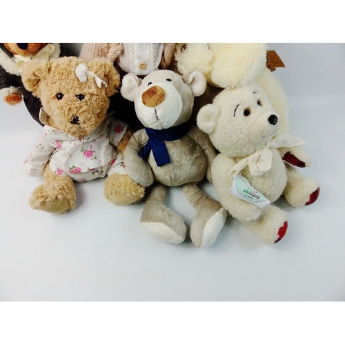 158 - A snuggle of eight teddies and one dog to include Powell Craft, Giorgio of Beverley Hills 1996, Volk... 