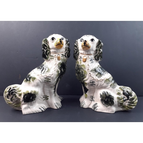 204 - A pair of Staffordshire crackleware WALLY DUGS in an unusual colourway, each standing approx 32cm.  ... 