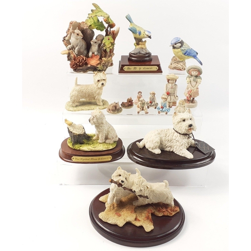 208 - A small collection of decorative pieces to include an Italian terrier, a Sheraton Simpson terrier du... 