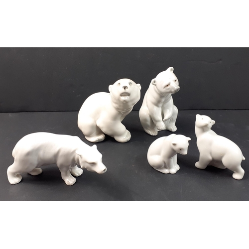 211 - A family of POLAR BEARS comprising five models by LLADRO, NAO and a Russan model.  A lovely little c... 