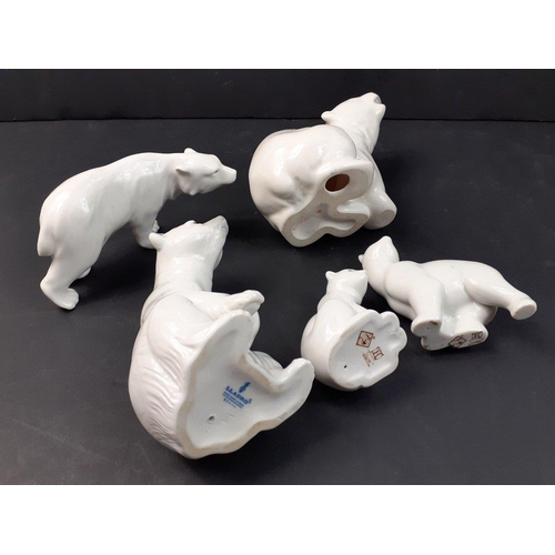 211 - A family of POLAR BEARS comprising five models by LLADRO, NAO and a Russan model.  A lovely little c... 