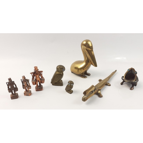 212 - A super collection of brass and copper decorative items to include a 12cm high pelican, a 20cm set o... 