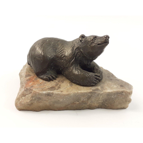 215 - A SIGGY PUCHTA limited edition (13/500) small bronze statue of a bear on marble base, base measures ... 