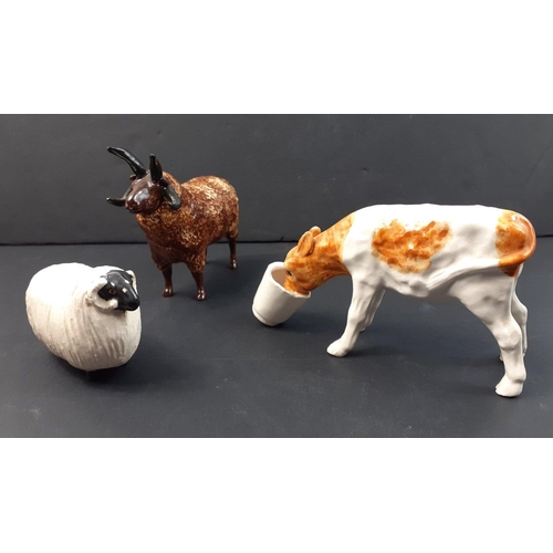 216 - SHEBEG Isle of Man Pottery group to include calf with bucket by D Thomson, Loughton four horn sheep,... 