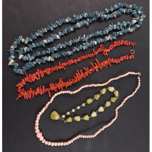 22 - A coral necklace with working clasp, approx 40cm long, plus a blue stone necklace approx 86cm long, ... 