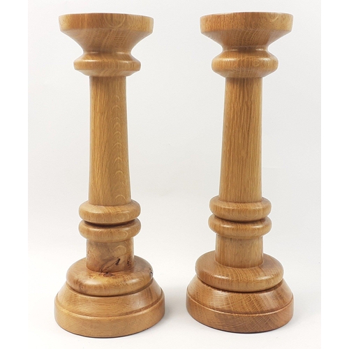 246 - PEEBLES INTEREST - A pair of beautifully turned wooden candlesticks by PETER NORRIS of Peebles, each... 