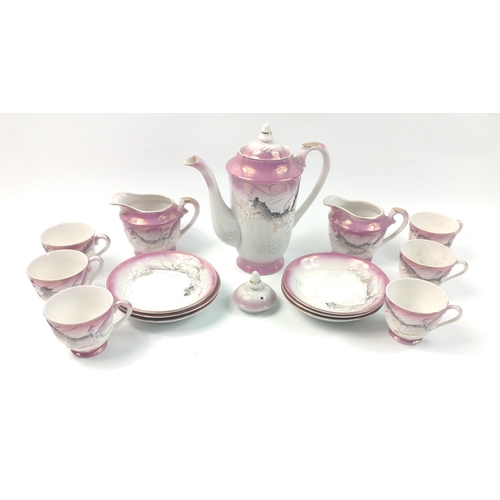 250 - A mainly pink NORITAKE style tea service with geisha lady with embossed dragon on each piece, 6 cups... 