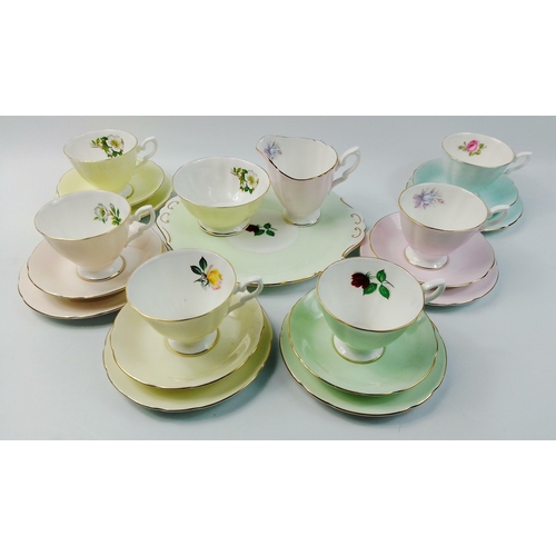 256 - A Royal Standard fine bone china tea service to include sandwich plate, 6 pastel harlequin cups and ... 