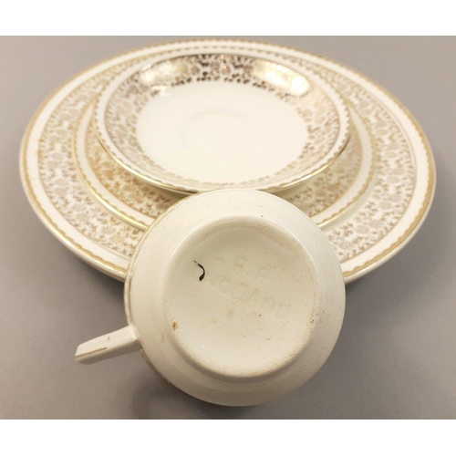 259 - A PORTLAND POTTERY tea set in cream and gilt to include two large (23cm) sandwich plates, 11x17cm si... 