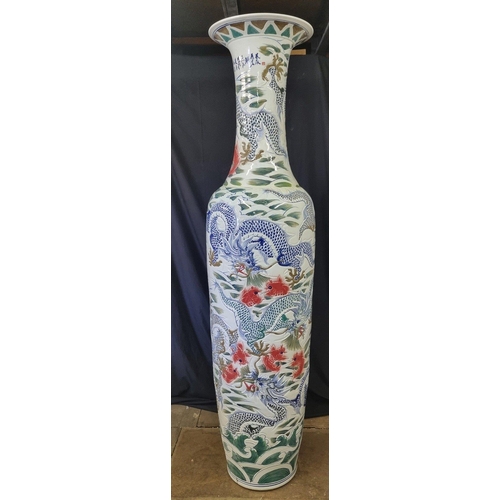 297 - An absolutely stunning original handmade porcelain vase which stands just over 7ft. The vase has gre... 