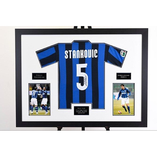 299 - A very rare signed framed shirt which has been personally signed by the famous Serbian footballer DE... 