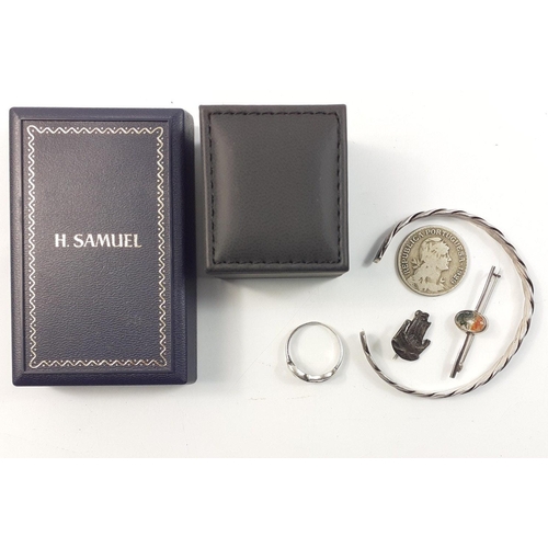 32 - A quantity of silver items to include a substantial 925 stamped ring with clear stones, size M,  gro... 