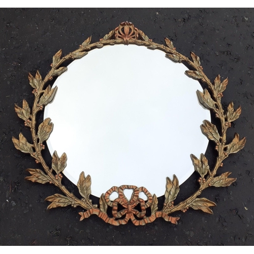 348 - EXQUISITE! - A very attractive gilt wreath framed circular hall mirror. Mirror plate measures 50cm d... 