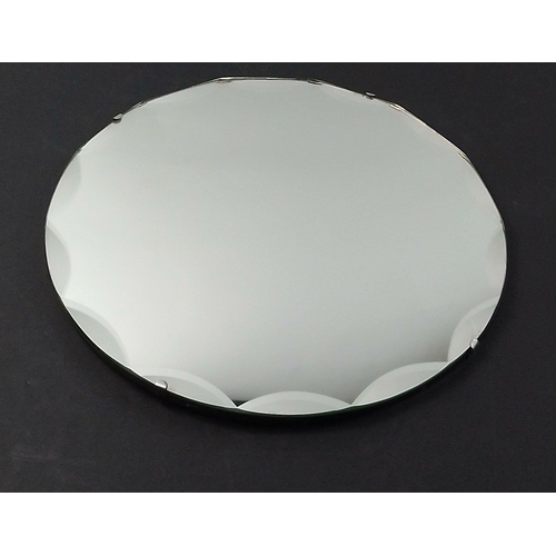 351 - A round mirror with scalloped edges diameter 40cm#354