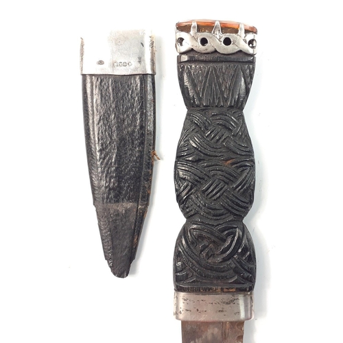 38 - A silver mounted, Glasgow 1950 hallmarked skean dubh (Scottish dirk) made by Robert Allison with Cai... 