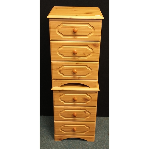 385 - Pair of pine effect 3 drawer bedside cabinets. W: 47cm H: 70cm D: 44cm approx#388