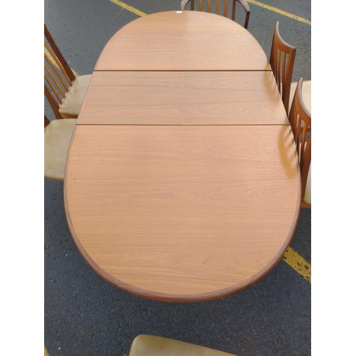 388 - Oval Fresco style G-PLAN table with leaf (W46cm), 4 dining chairs and 2 carver chairs. Upholstered i... 