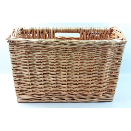 389 - A wicker magazine rack in good clean condition W42 x H30cm#392