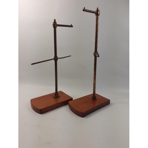 410 - A pair of haberdashery shop display stands in brass on modern wooden stands. Stand 45cm tall#413