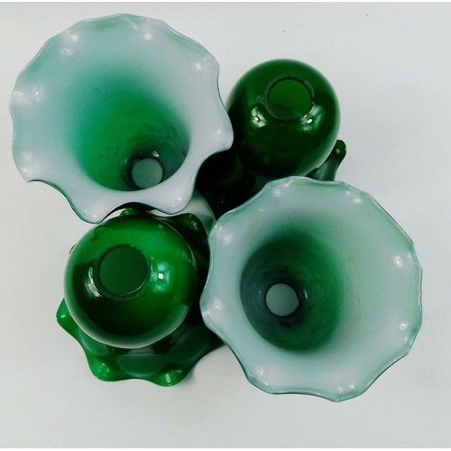 430 - Four tulip shaped green glass lampshades each 15cm tall. All in good order#433