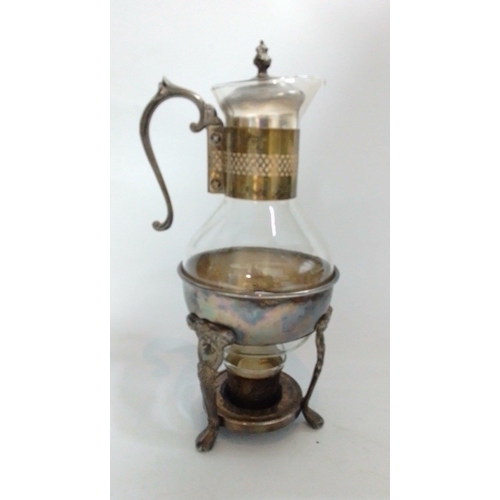 44 - A vintage silver plated 27cm glass coffee pot with warmer stand.  Crack in lid.#44