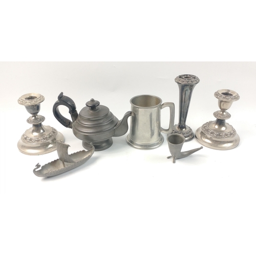 46 - A small metalware lot to include 2 plated squat candlesticks 12cm, 1 posy vase 15cm, a VICAR' s teap... 