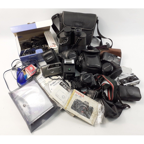 464 - A box of cameras and accessories to include a PENTAX Super A, Olympus Newpic XB, a ROLLEI 35, a YASH... 