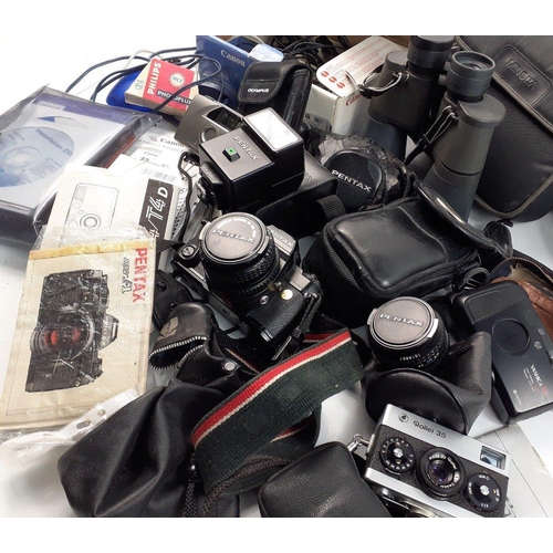 464 - A box of cameras and accessories to include a PENTAX Super A, Olympus Newpic XB, a ROLLEI 35, a YASH... 