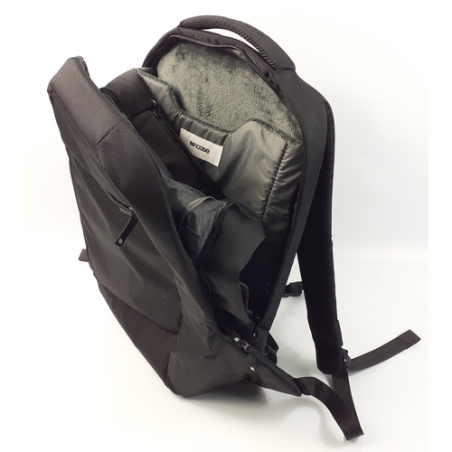 469 - An INCASE laptop backpack with sections for accessories#472