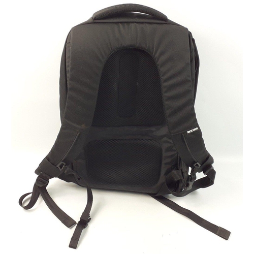 469 - An INCASE laptop backpack with sections for accessories#472